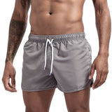 Wrap men's shorts, home pants, smooth beach boxers, slim swimwear